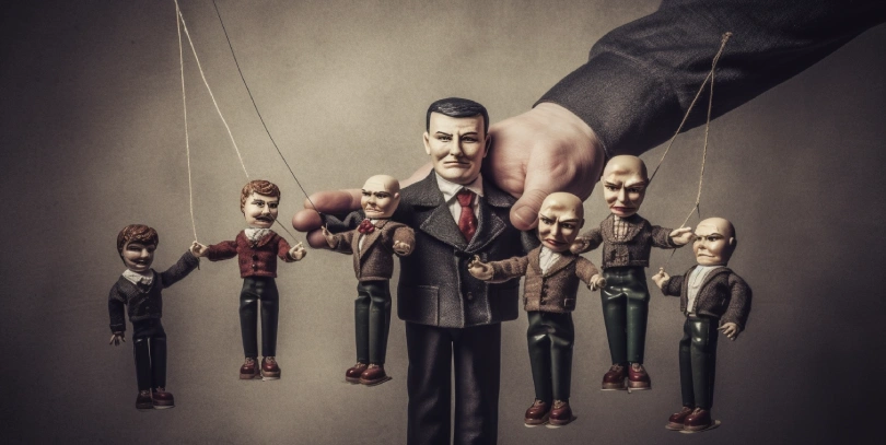 People are puppets in the big man's hand.